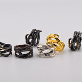 Edera - Anillo de plata oxidada con circonita blanca