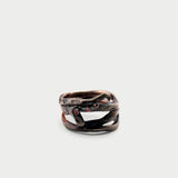 Edera - Anillo de plata oxidada con circonita roja