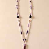 Collar largo de tonos violeta hecho a mano de piedras naturales